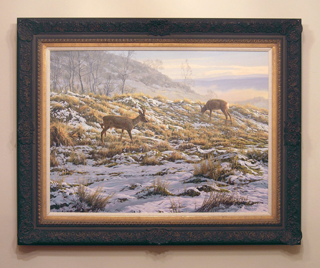 Dark framed original oil painting of roe deer in snow