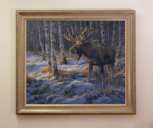 Framed original oil painting of a bull moose in snow